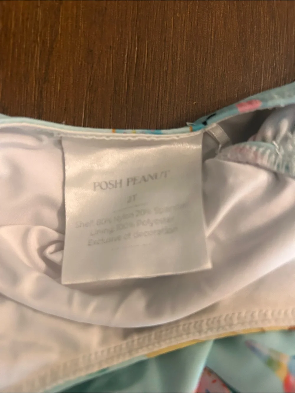 Two 2T Posh Peanut swimsuits